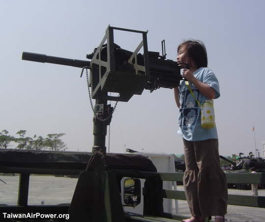 My daughter training a grenade launcher