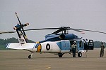 S-70C-1 7004 before an administrative transport mission. Note access steps on both sides of lower fuselage.
